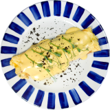 Omelet with chicken and cheese sauce