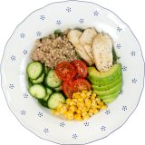 Bowl with green buckwheat and vegetables