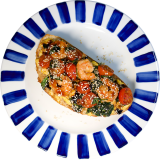 Scramble with shrimp on toast