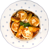 Syrniki with caramel and apple