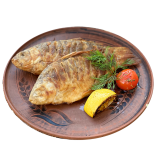 Fried crucian carp in a pan