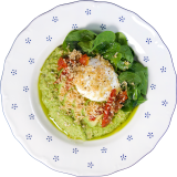 Oatmeal with spinach and poached egg